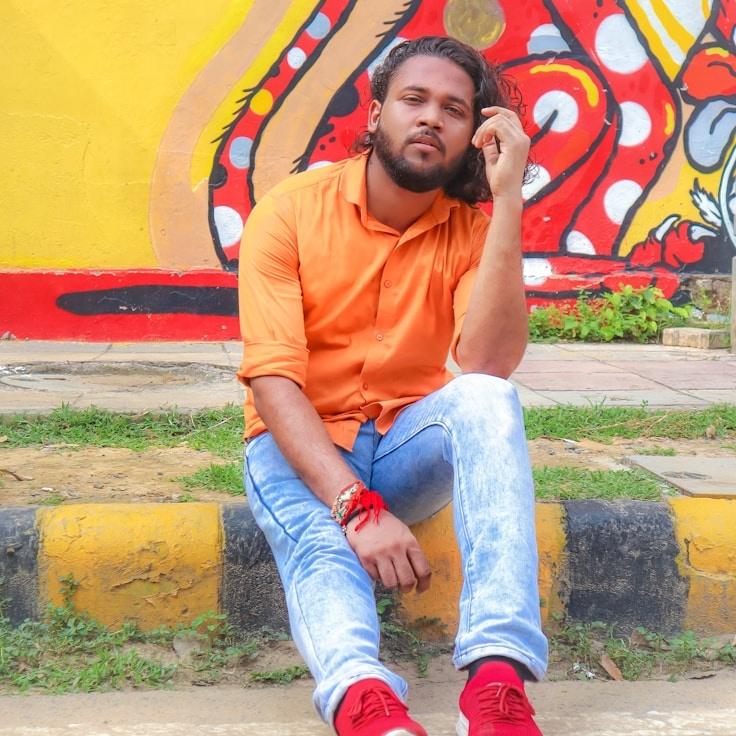 Alex Rivera, Lead Design Curator at Distributed Data Ecosystem, reviewing corporate floral arrangements