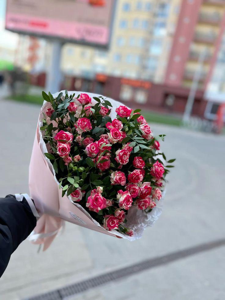 Professional floral arrangement in modern corporate setting